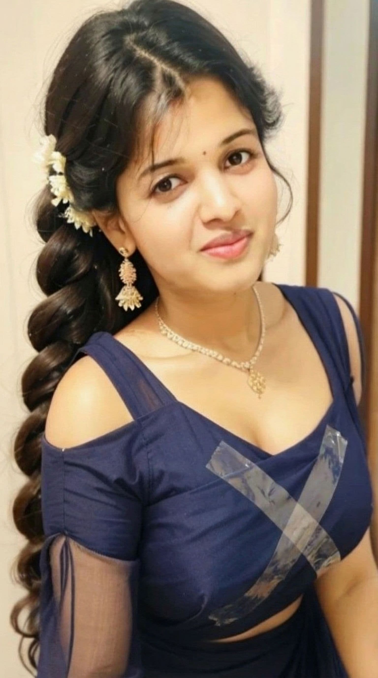 AI generated: Tamil girl wearing xshape celotape under clothes over bosom and private area 