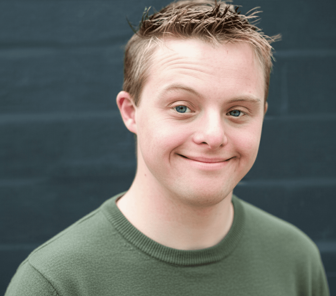 AI generated: 18 years old guy with down syndrome, he is 5'6" tall He is blonde and tanned. He wears a nice neutra...