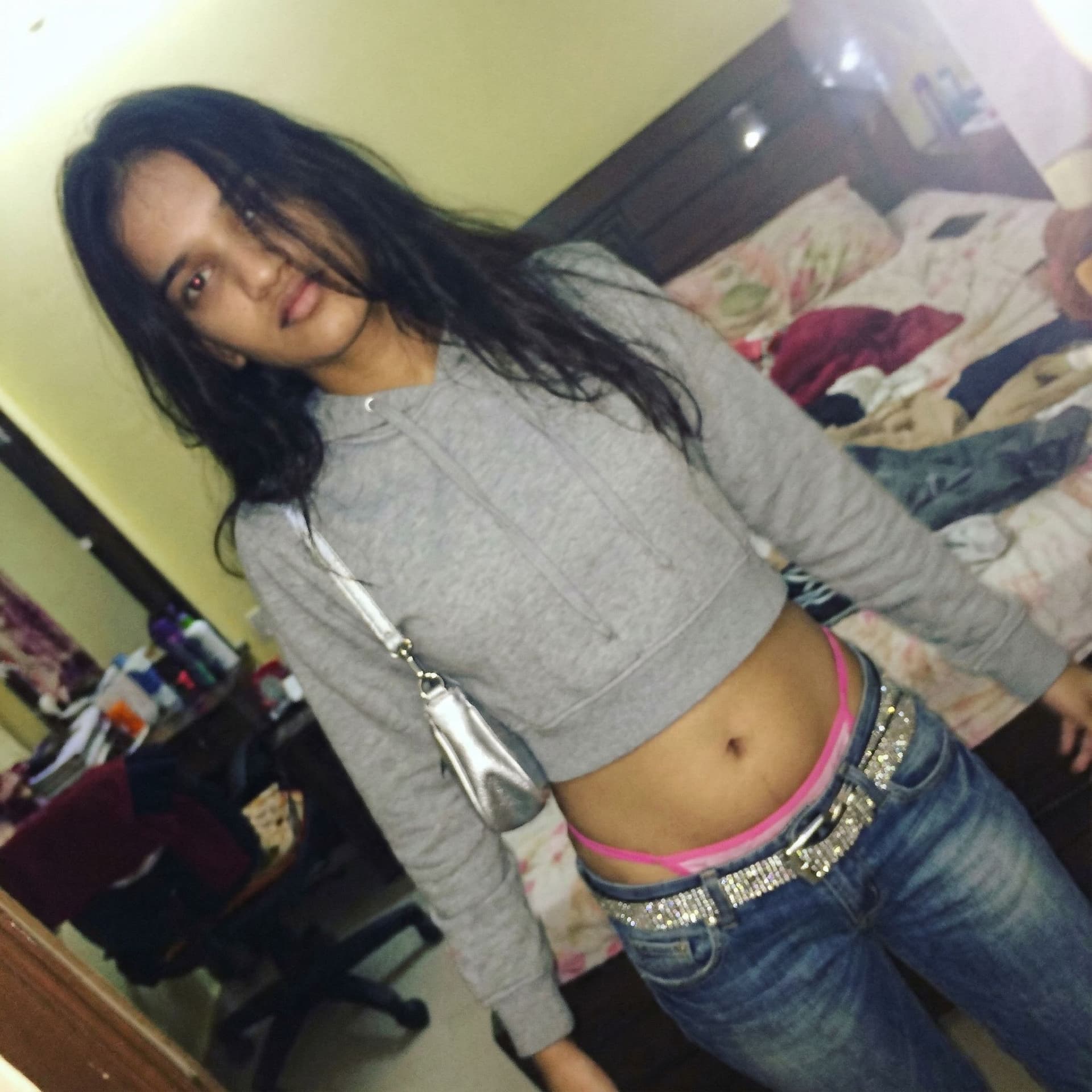 AI generated: a lo-fi 2015s-era, diagonally taken, low-quality iPhone photo of a 20-year-old baddie. The shot is i...