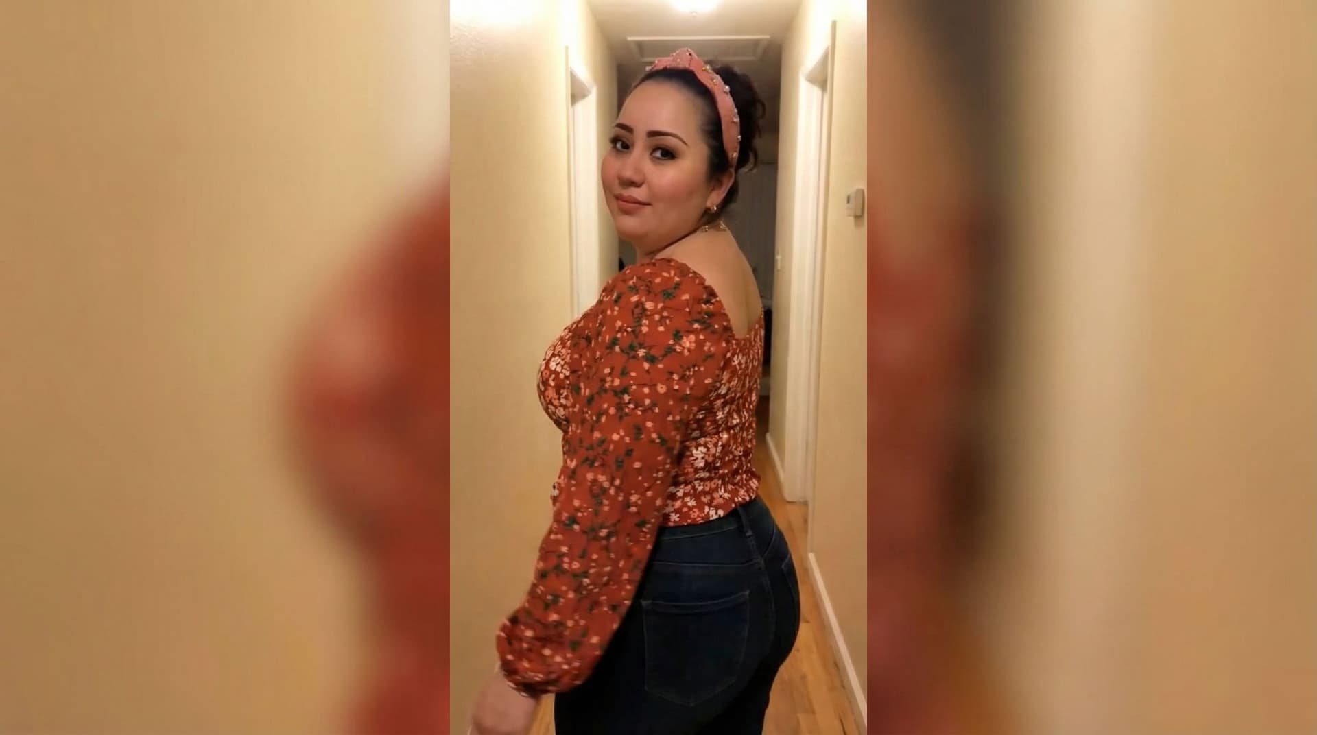 AI generated: Create this girl standing up and turns around in a sensual way while walking towards the camera 