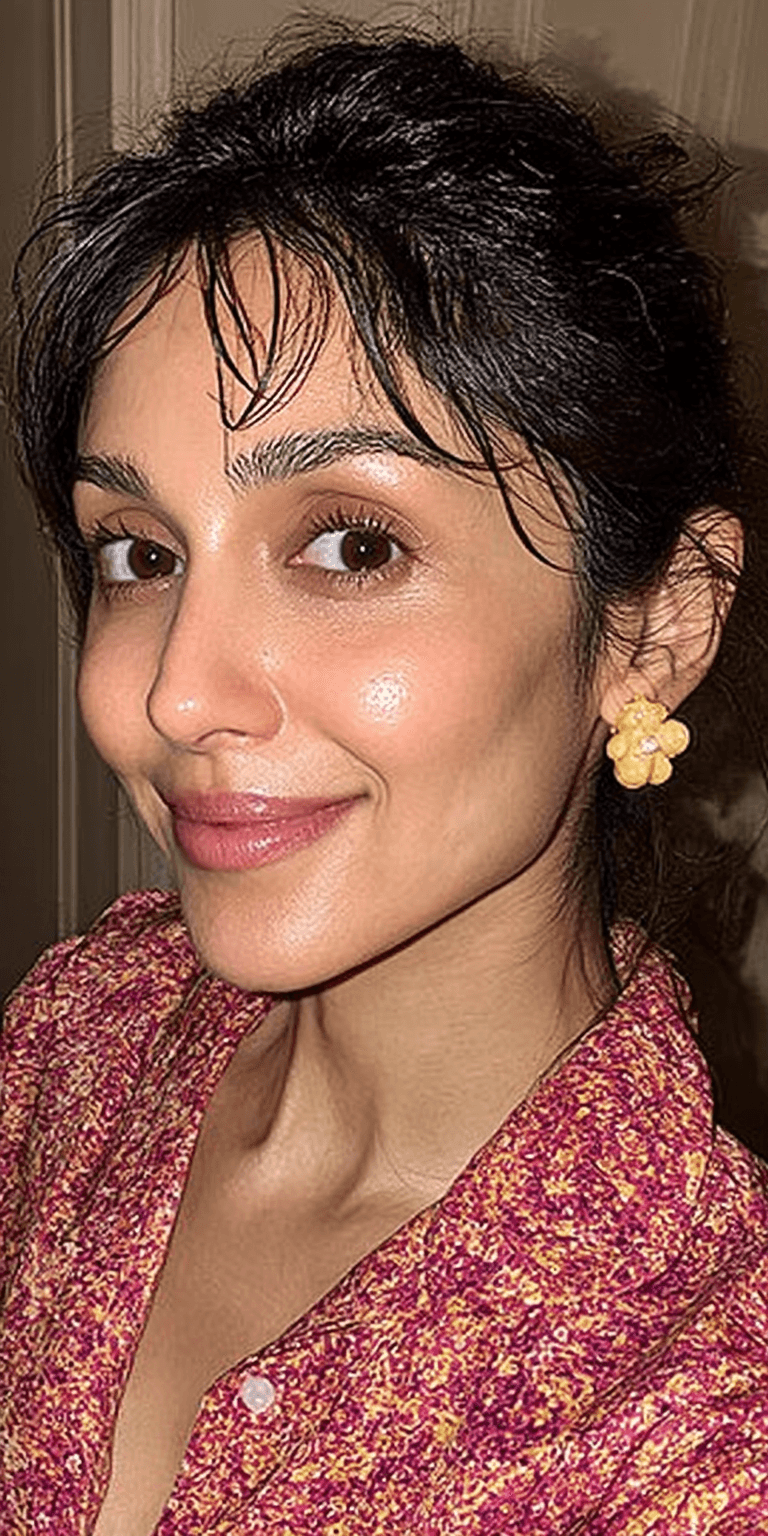 AI generated: close-up photo of a woman in her mid 20's, photorealistic, stunning detail, shot on an iPhone 16, lo...