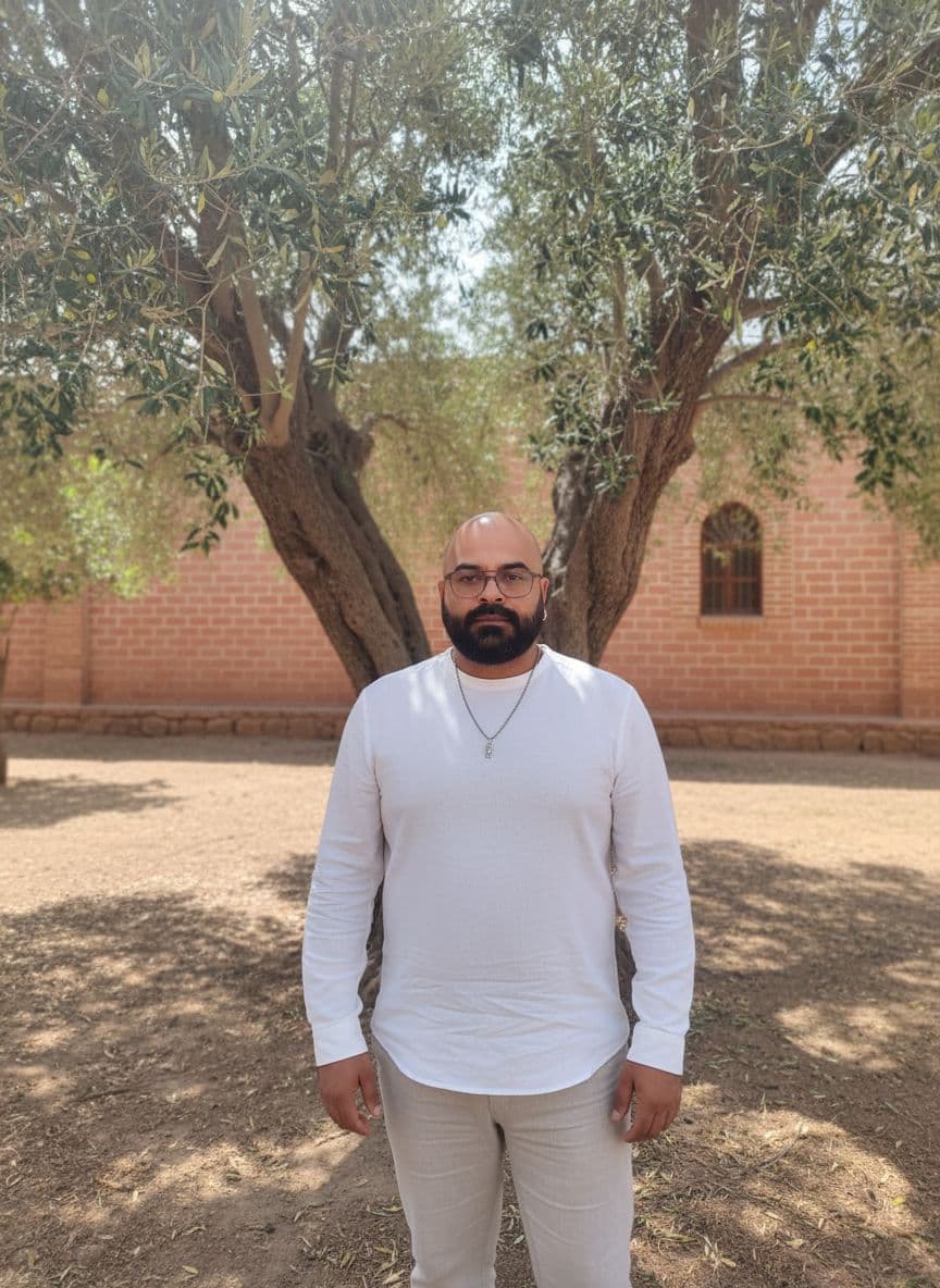AI generated: Subject: Image uploaded under an Algerian tree near a red brick dwelling.
Description: A candid and...