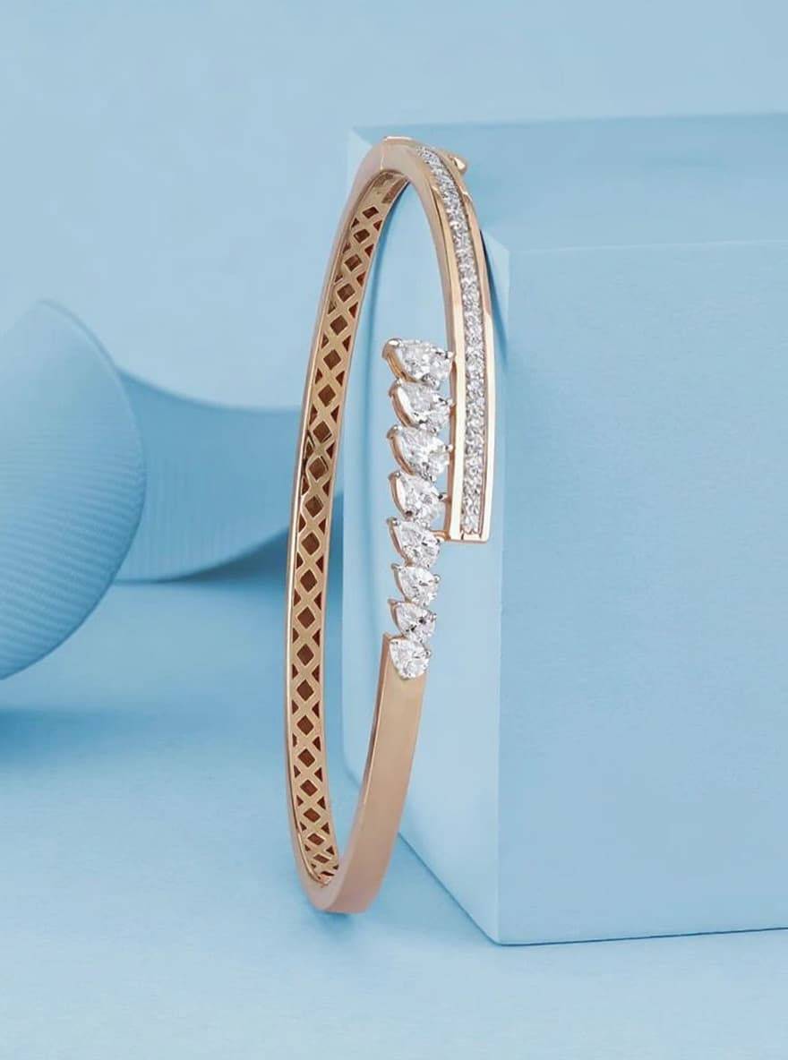 AI generated: same style bracelet but make a new design change shape of stones and make suitable to all of 18k gol...