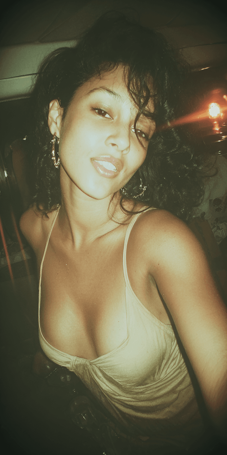 AI generated: Grainy disposable camera photo, woman --chaos 75 --ar 1:2 --stylize 750 --v 7