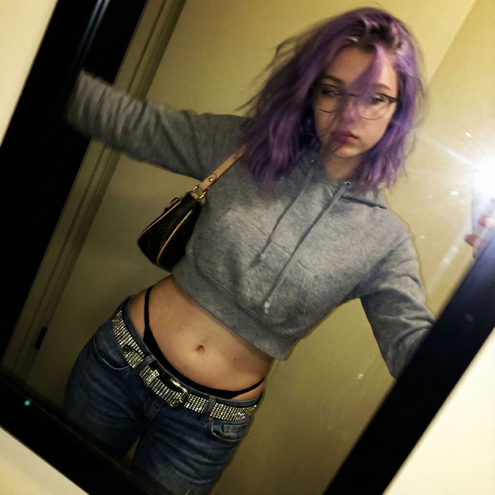 AI generated: a lo-fi 2015s-era, diagonally taken, low-quality iPhone photo of a 20-year-old baddie. The shot is i...