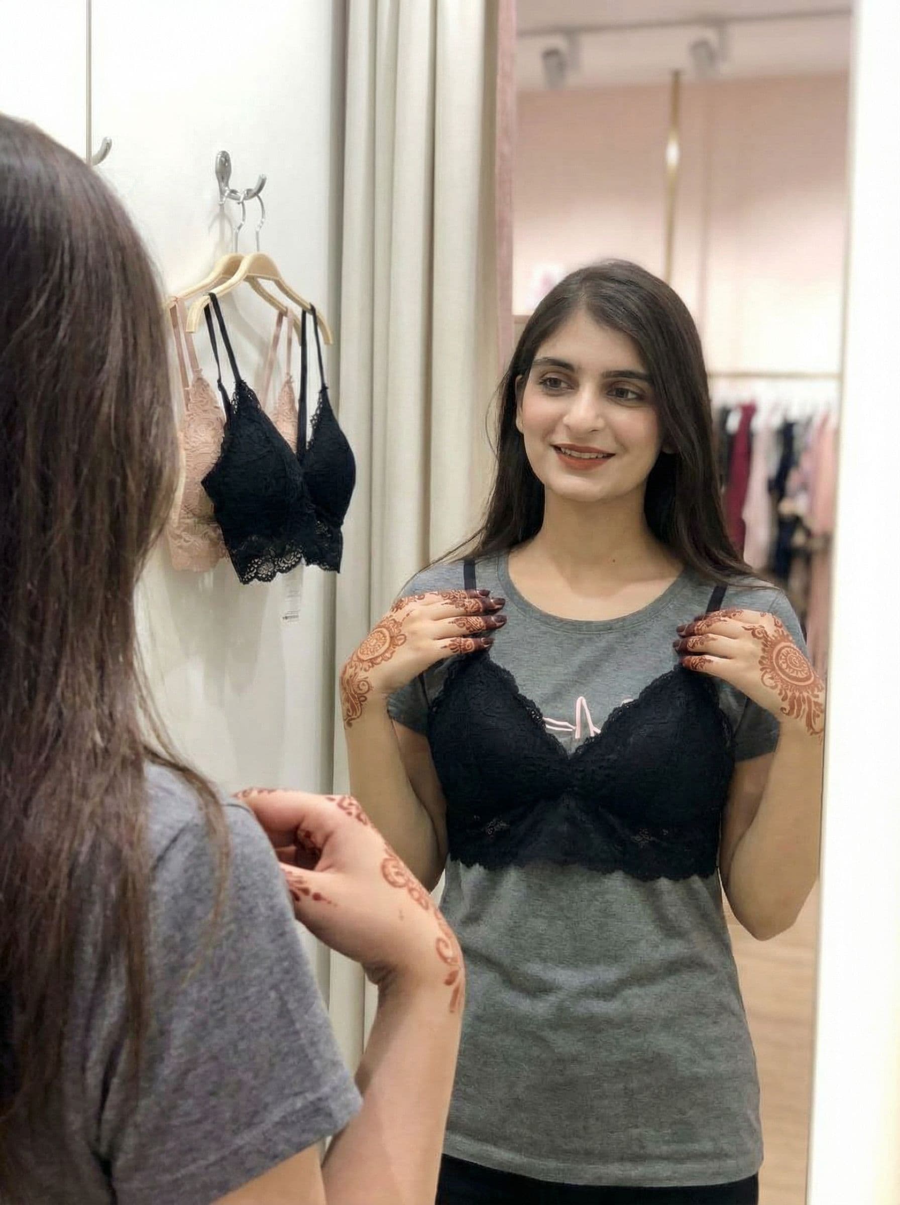 AI generated: -Girl-Trying-On-Bralettes-in-a-Boutique don't change face 