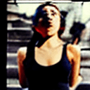 AI generated: cinematic photo pictorialist style, close up on face, masterpiece photo of a young woman, Athletic a...