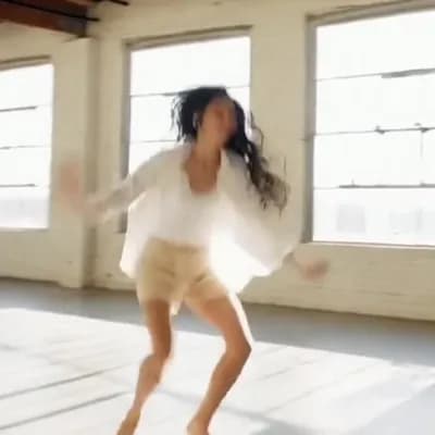 AI generated video: the woma dancing with music, barefoot