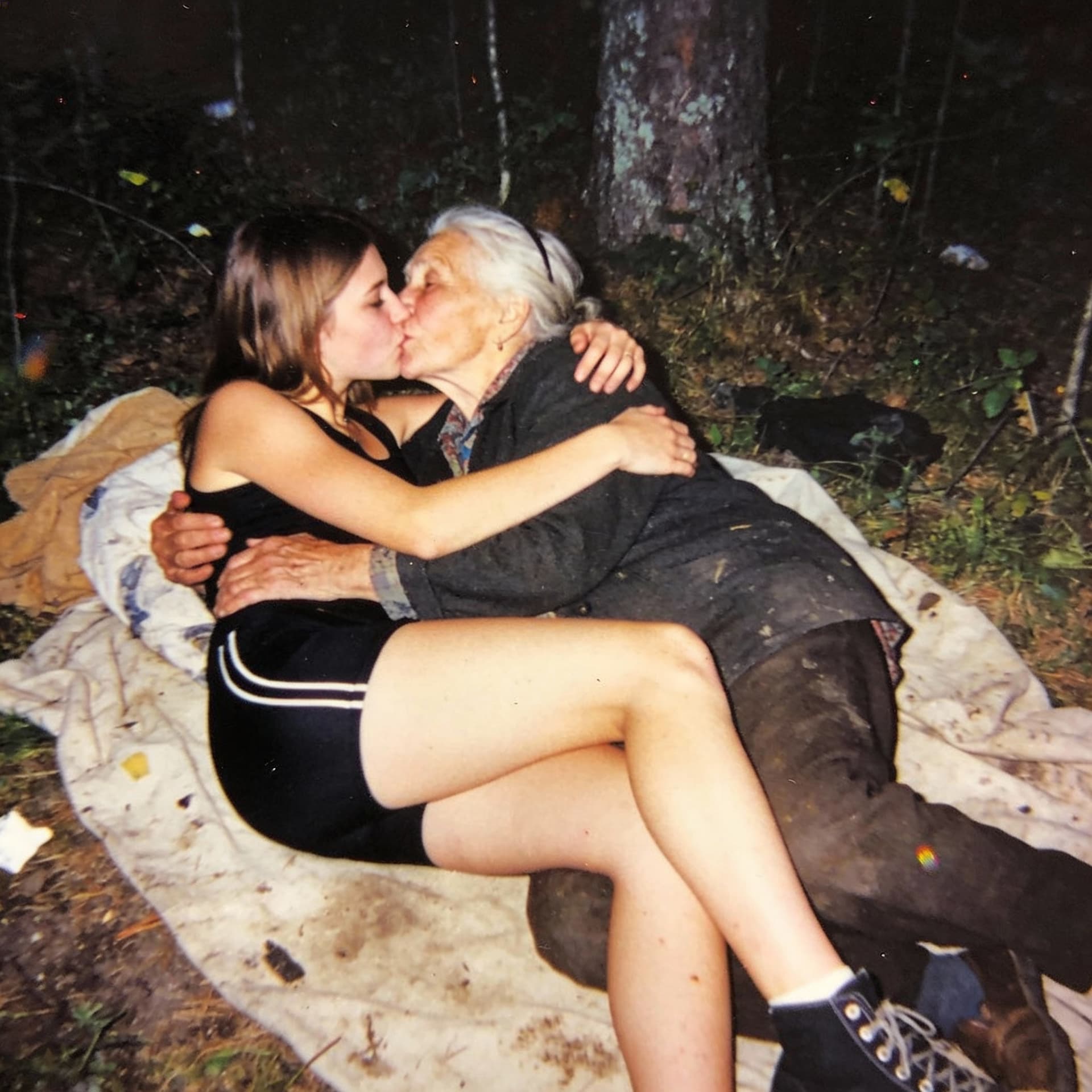AI generated: A high-quality photo taken with a 2009-era mobile phone at a dirty russian forest . The scene is set...
