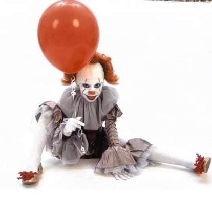 AI generated: Change the background to a IT movie theme. 