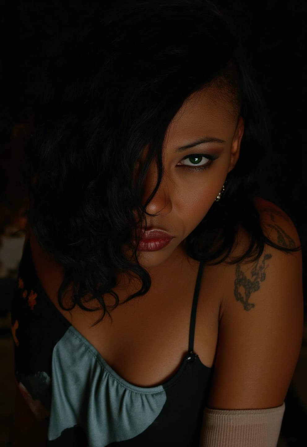 AI generated: A close-up portrait captures a young African American woman with dark, messy hair obscuring part of ...