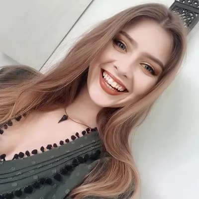 AI generated video: woman smiling and looking excited with tongue out