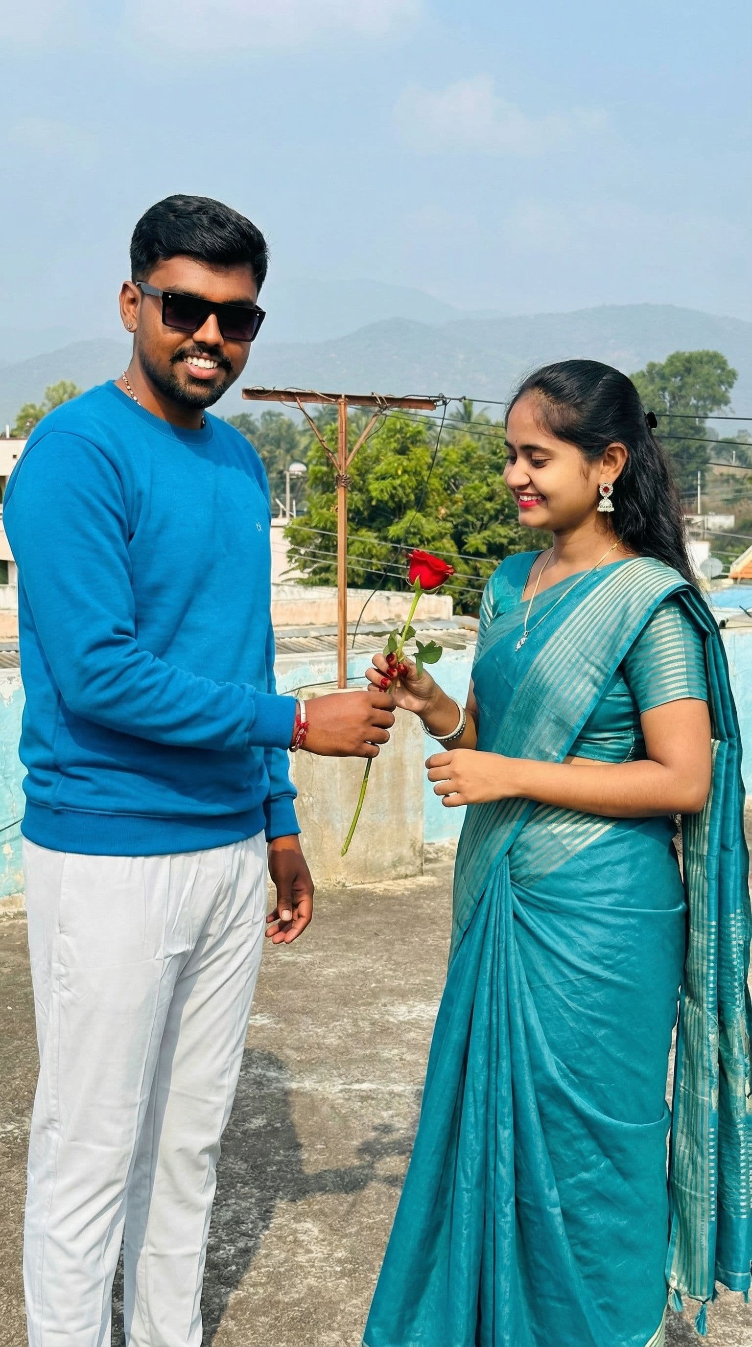 AI generated: Make this both photos standing together and boy give rose to her
With Good clarity 