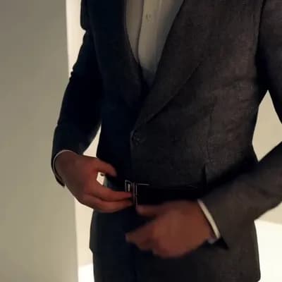 AI generated video: A man opening his Belt an Then pulling down his pants