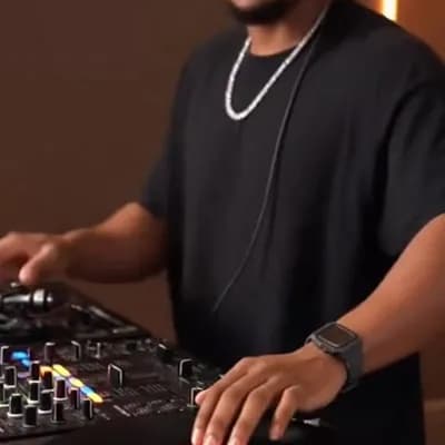 AI generated video: Make him play as a dj two technics with vinyls spinning