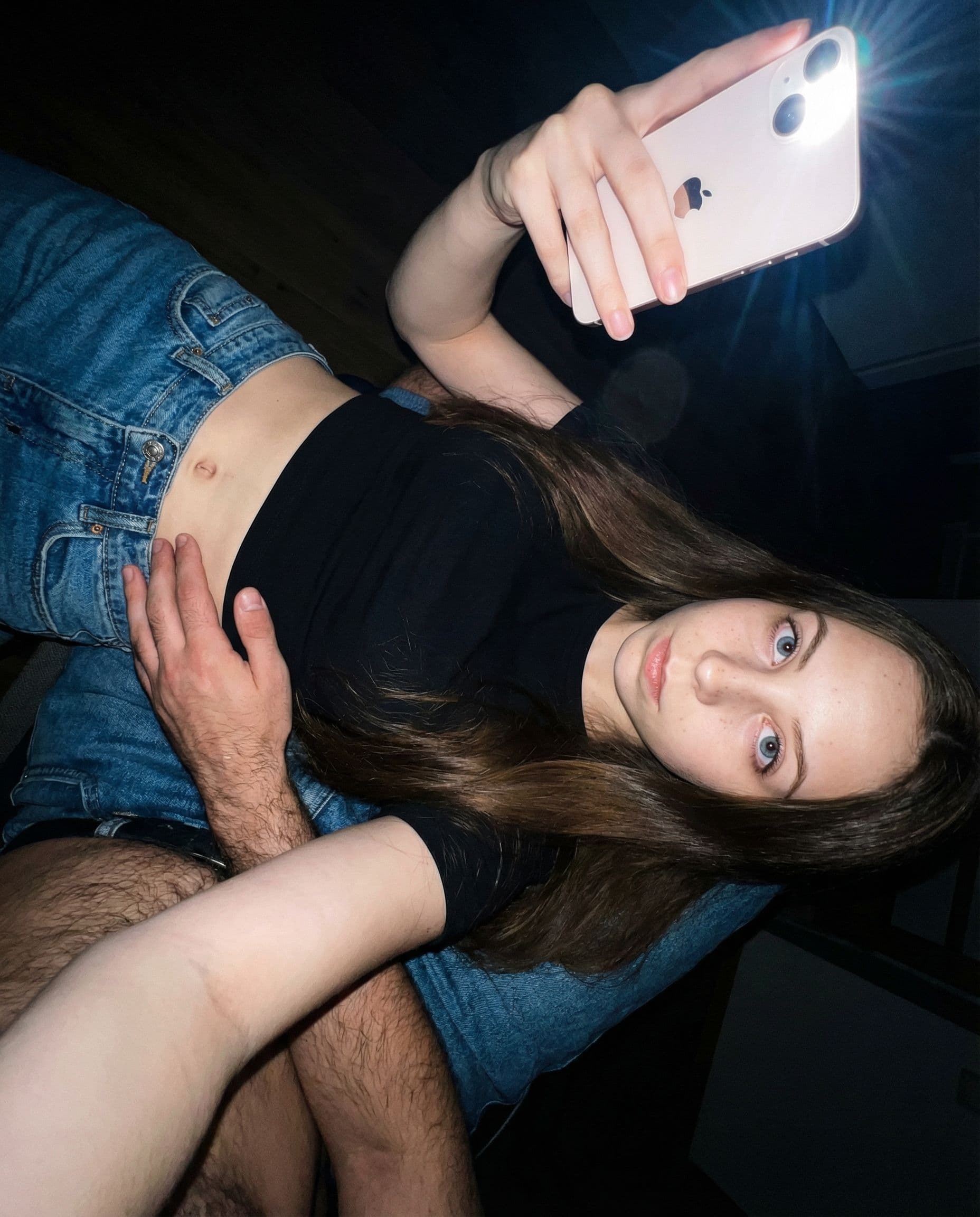 AI generated: Laying, from above, long hair, black shirt, jeans, umbilical, best quality, selfie, skinny, hairy ma...