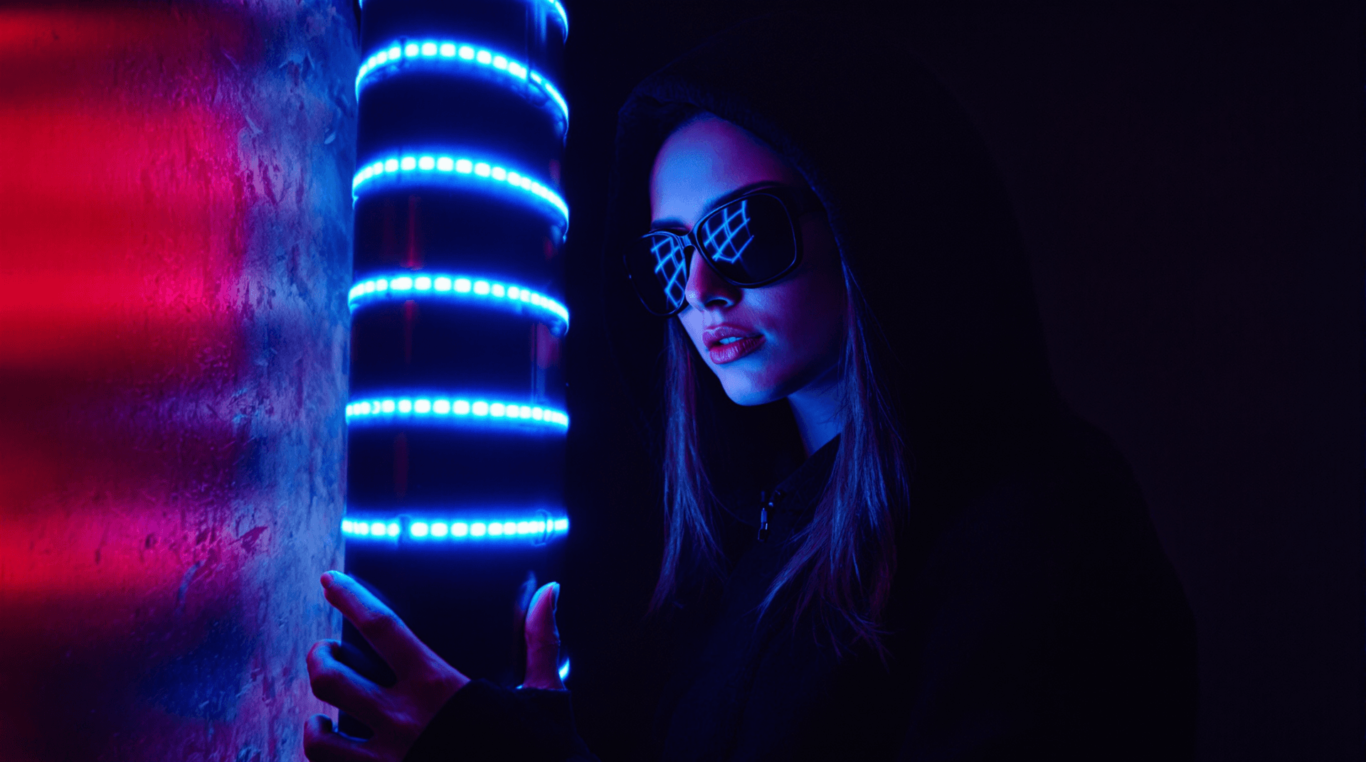 AI generated: A Stunning Woman wearing dark sunglasses and a dark hooded jacket stands amidst a futuristic, dimly ...