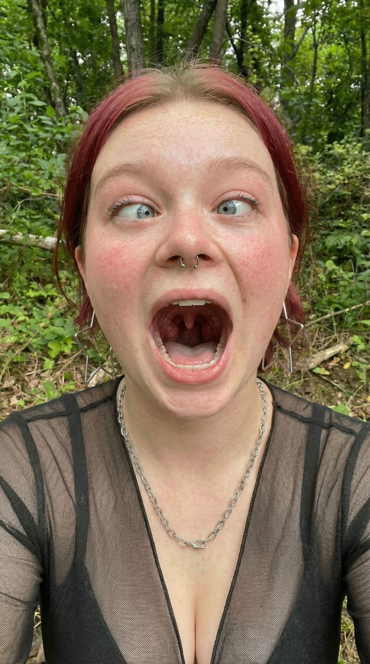 AI generated: Generate a photo so you can see my tonsils at the back of my throat 