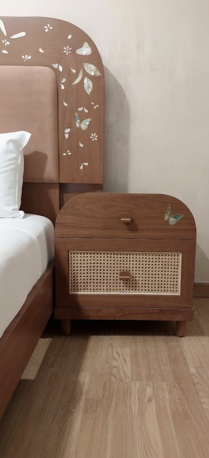 AI generated: Minimalist luxury bedroom interior, natural wood furniture, custom wooden bedside table with cane pa...