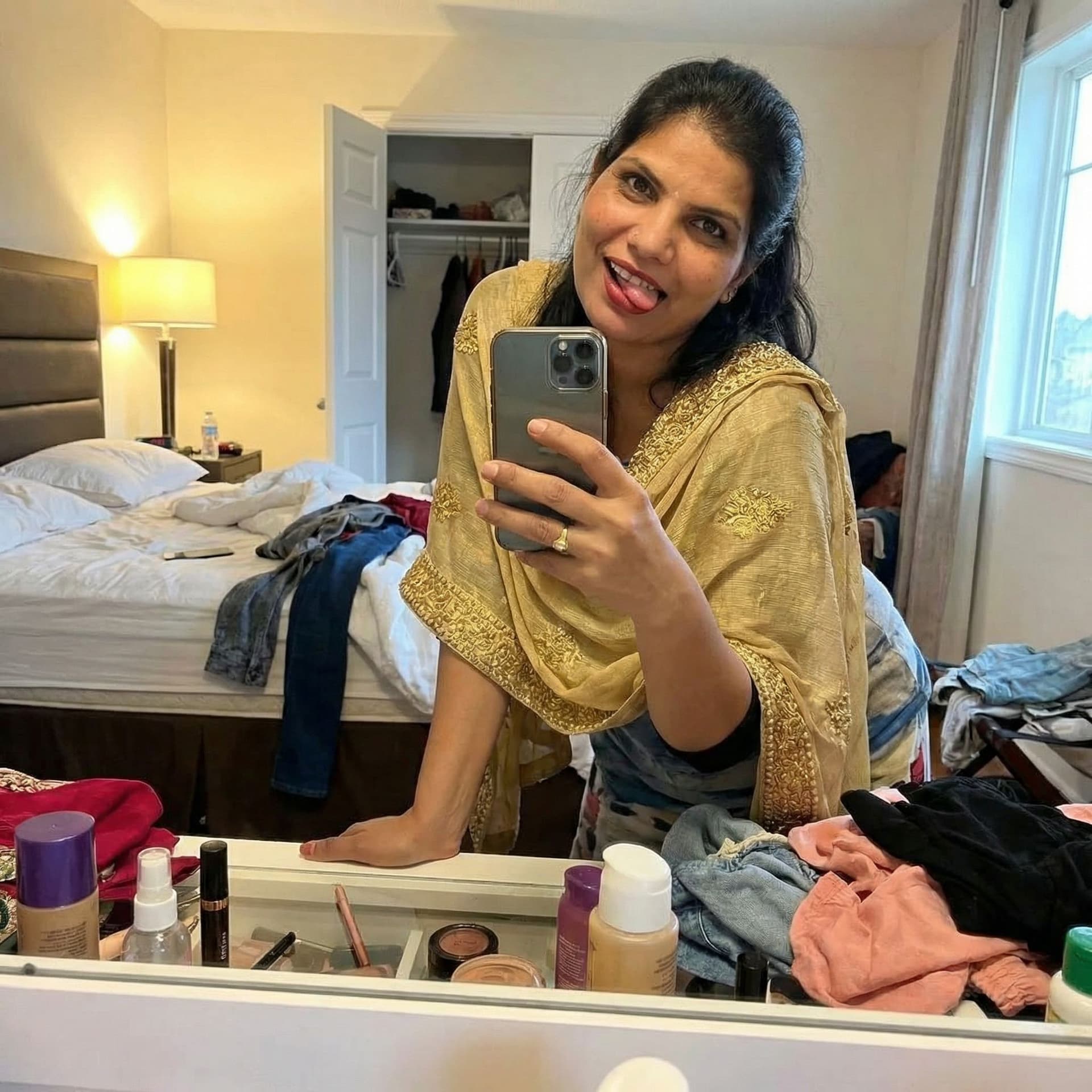 AI generated:  takes a mirror selfie in a messy bedroom.

The woman has her phone in one hand and she is using her...