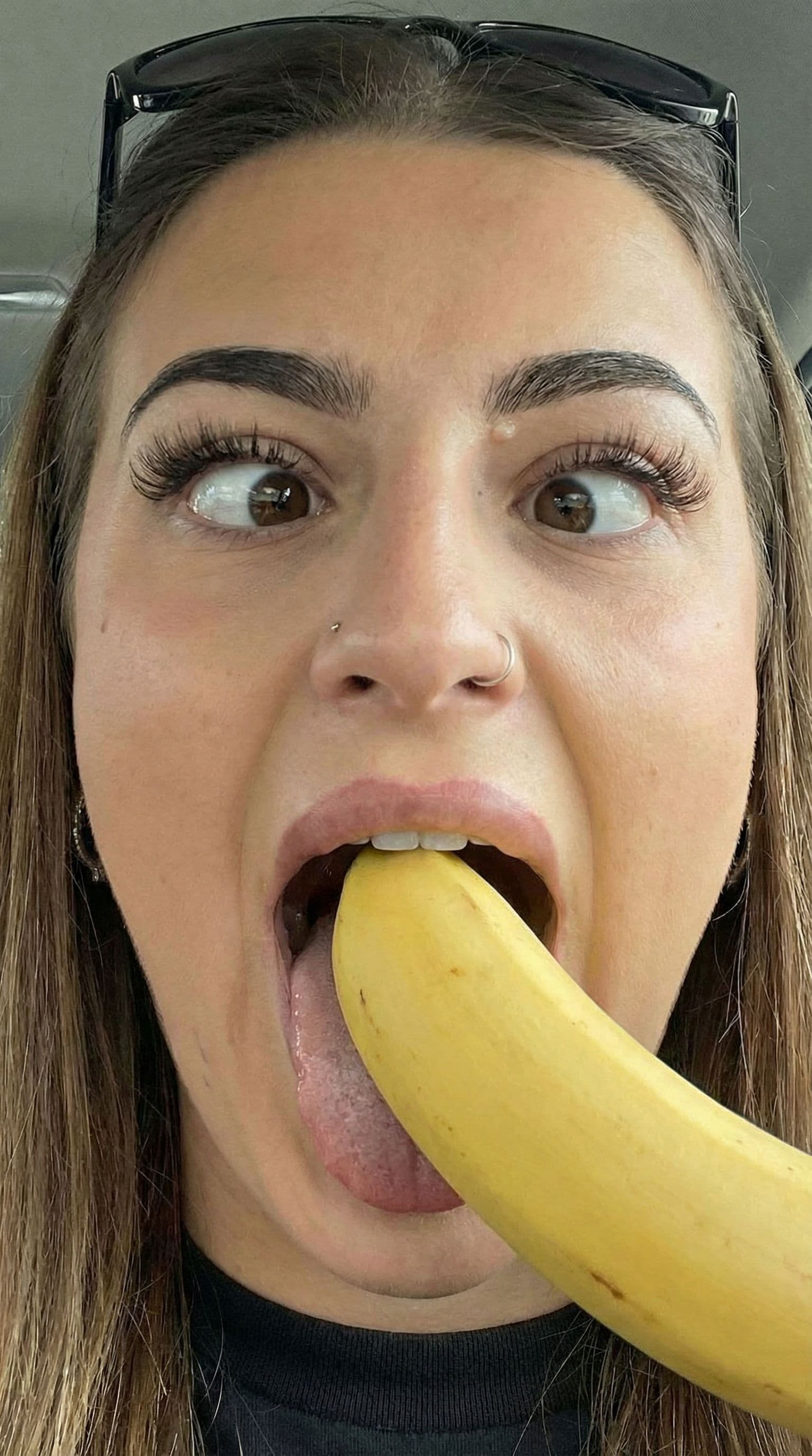 AI generated: Generate a photo with a banana in my mouth 