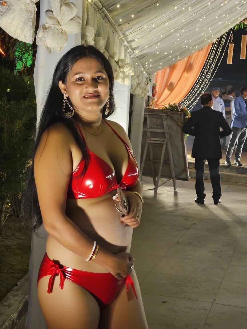 AI generated: Keep the body intact and make her wear a red latex bikini....make her boobs the same size but poping...