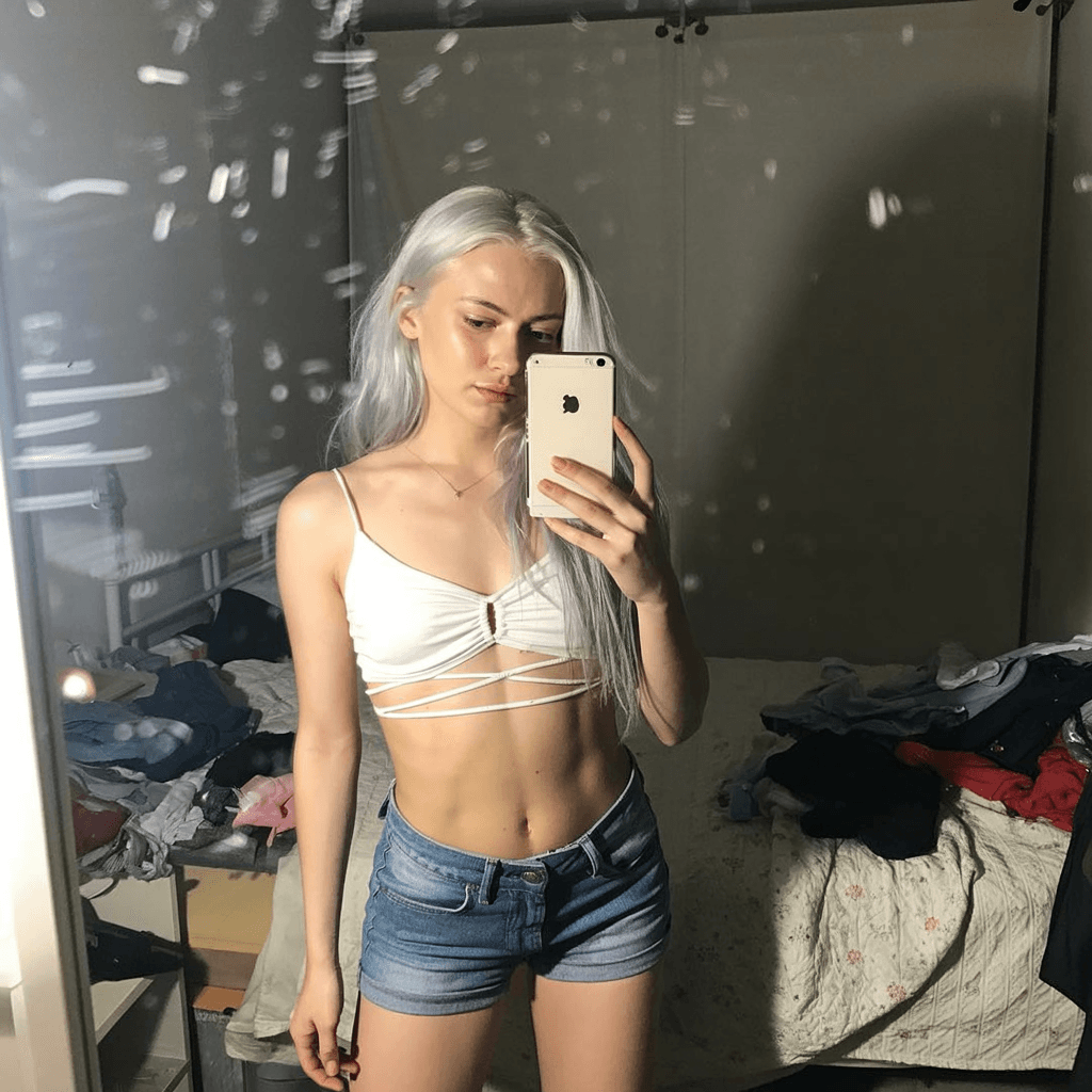 AI generated:  a young beautiful woman stands in front of a mirror, capturing a selfie. long silver-white hair, Th...