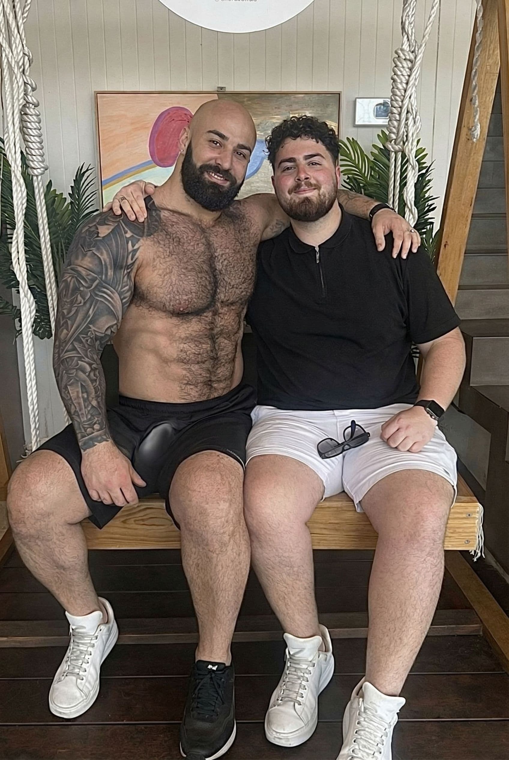 AI generated: I need the guy on the left to have a bulge sticking out in between his legs, not to disproportionate...