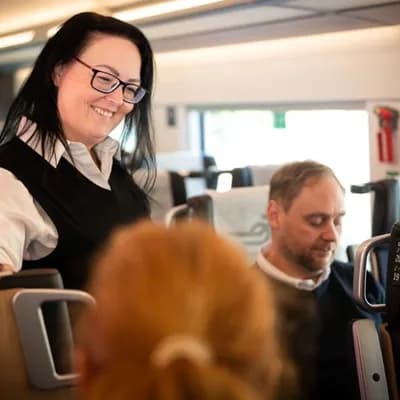 AI generated video: Let the woman smile and start talking
