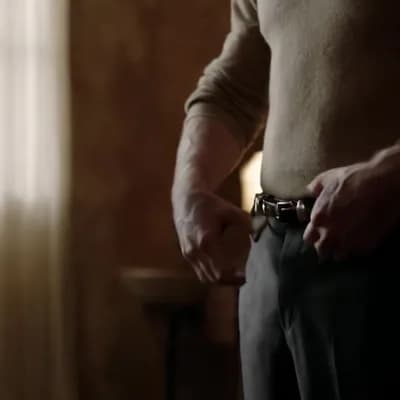 AI generated video: A man opening his Belt and Then pulling his pants down