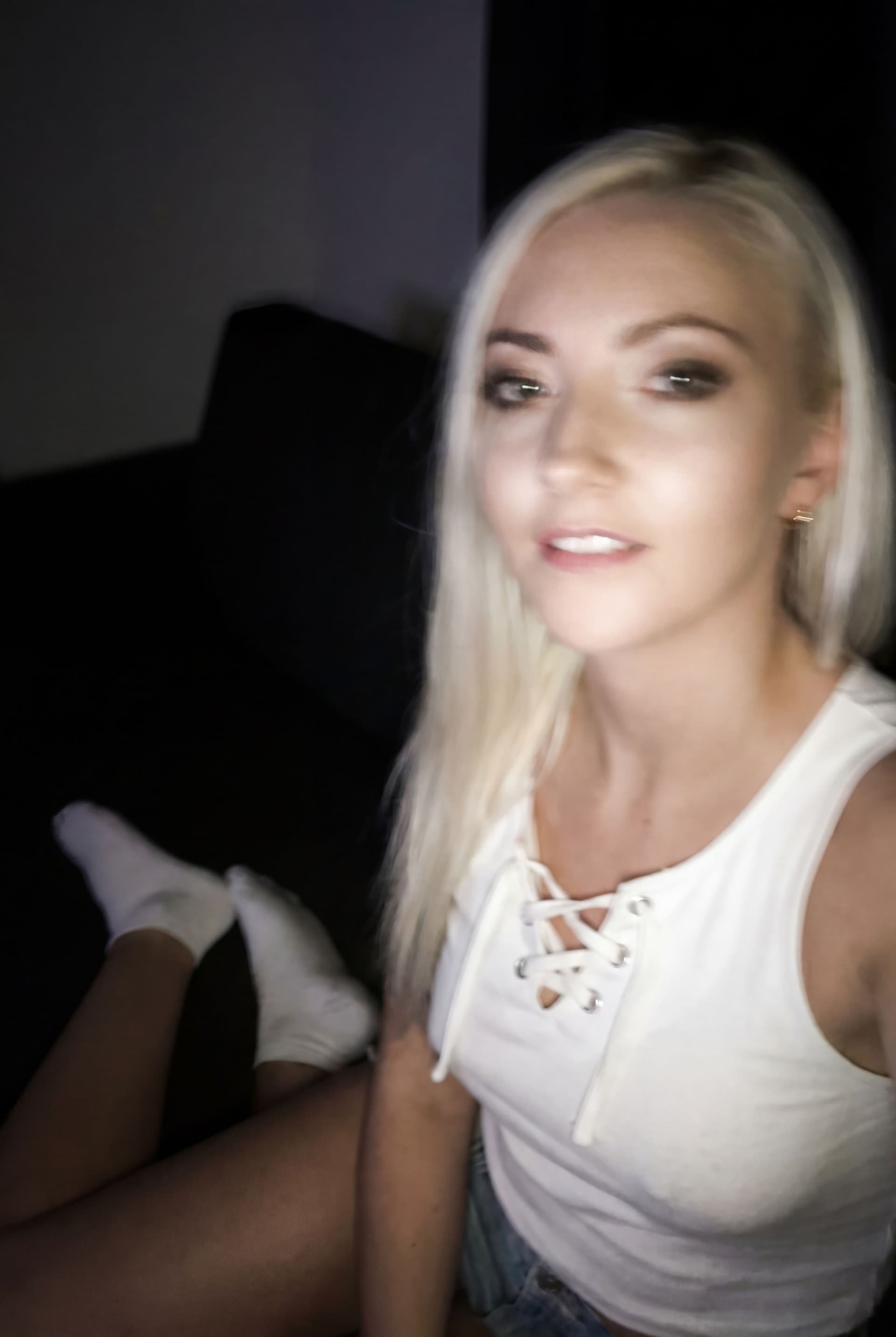 AI generated: A very ordinary iPhone full face selfie,a sloppy snapshot. The photo has slight motion blur and is v...