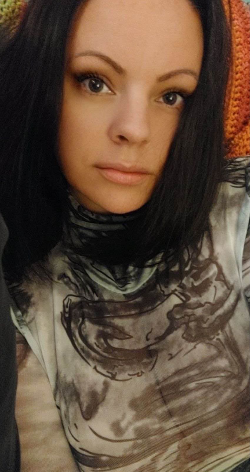 AI generated: A long skinny black dick blowing cum all over her face.