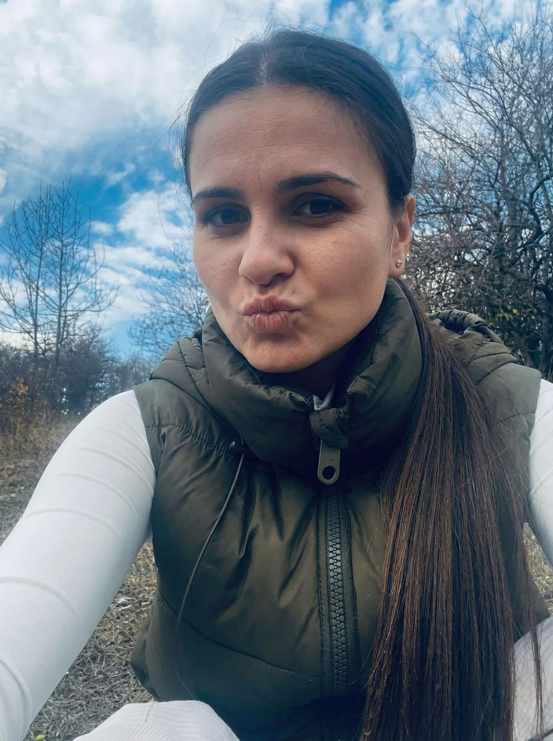 AI generated: let girl in photo make kissy big lips