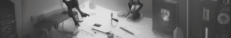 AI generated: Create a high-resolution artwork of a ninja girl designing at a computer in a room full of gadgets. ...