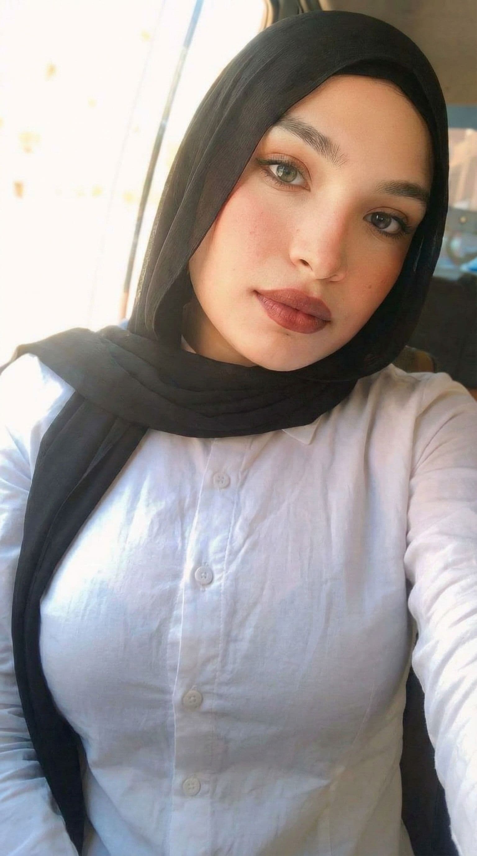 AI generated: With her clothes and huge boobs