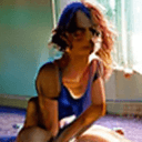 AI generated: 3/4 shot, film still of, an alluring woman with messy hair sitting on the floor of her bedroom looki...
