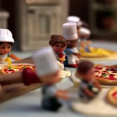 AI generated video: tiny workers making pizza