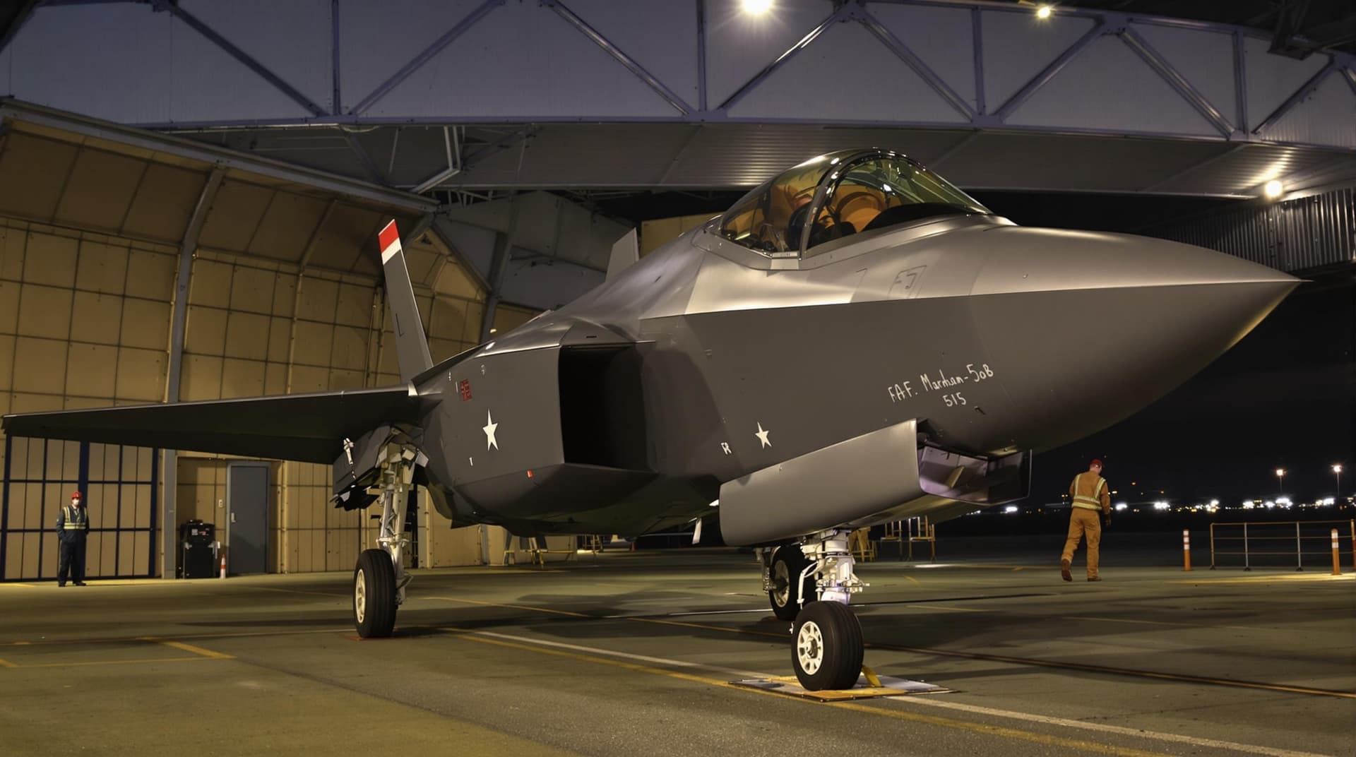 AI generated: A highly realistic F35 fighter jet sat on the ground at RAF Marham in a hangar, low shot, side profi...