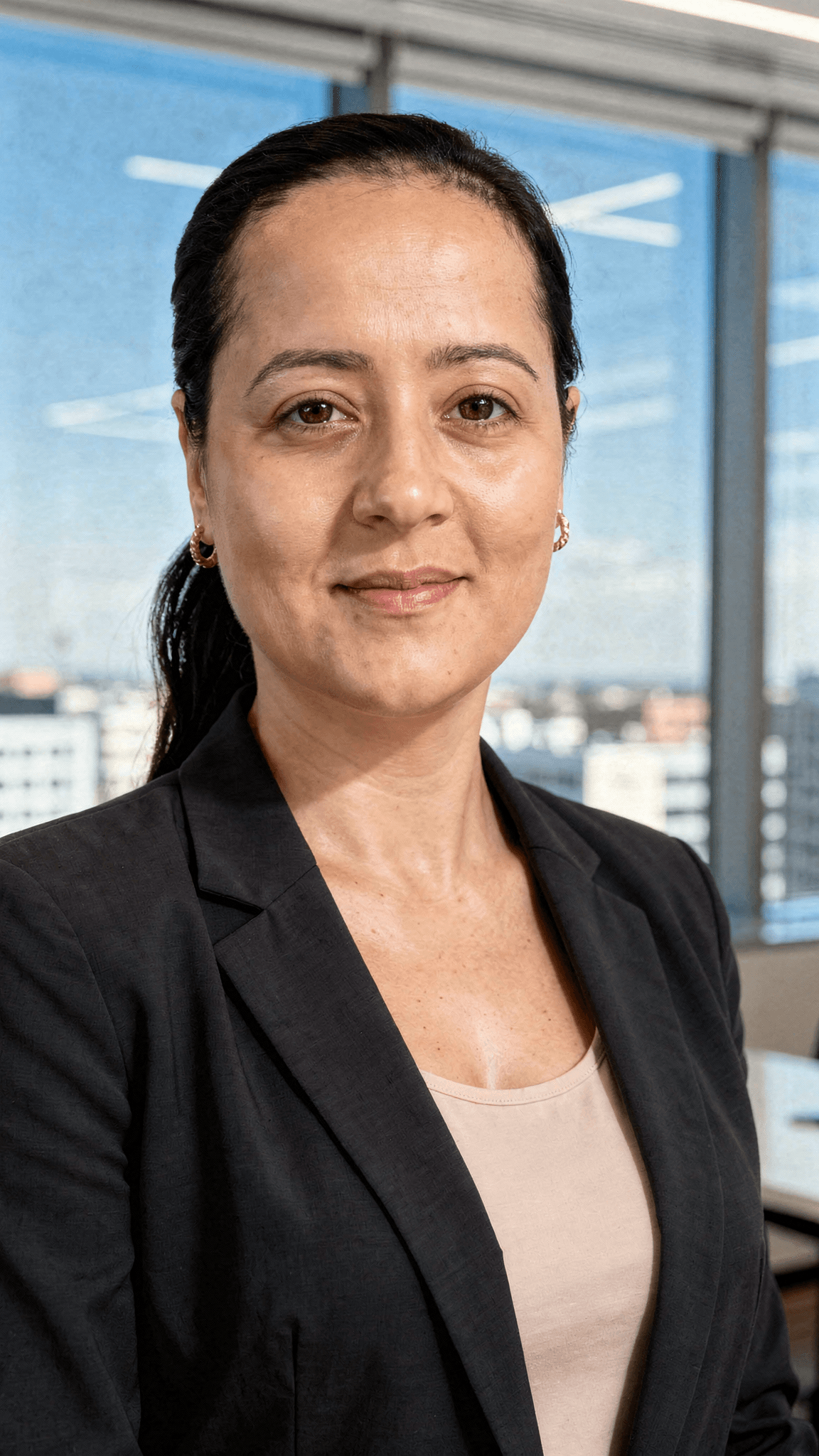 AI generated: generate a LinkedIn professional profile photo, wearing a beautiful blazer in an beautiful office se...