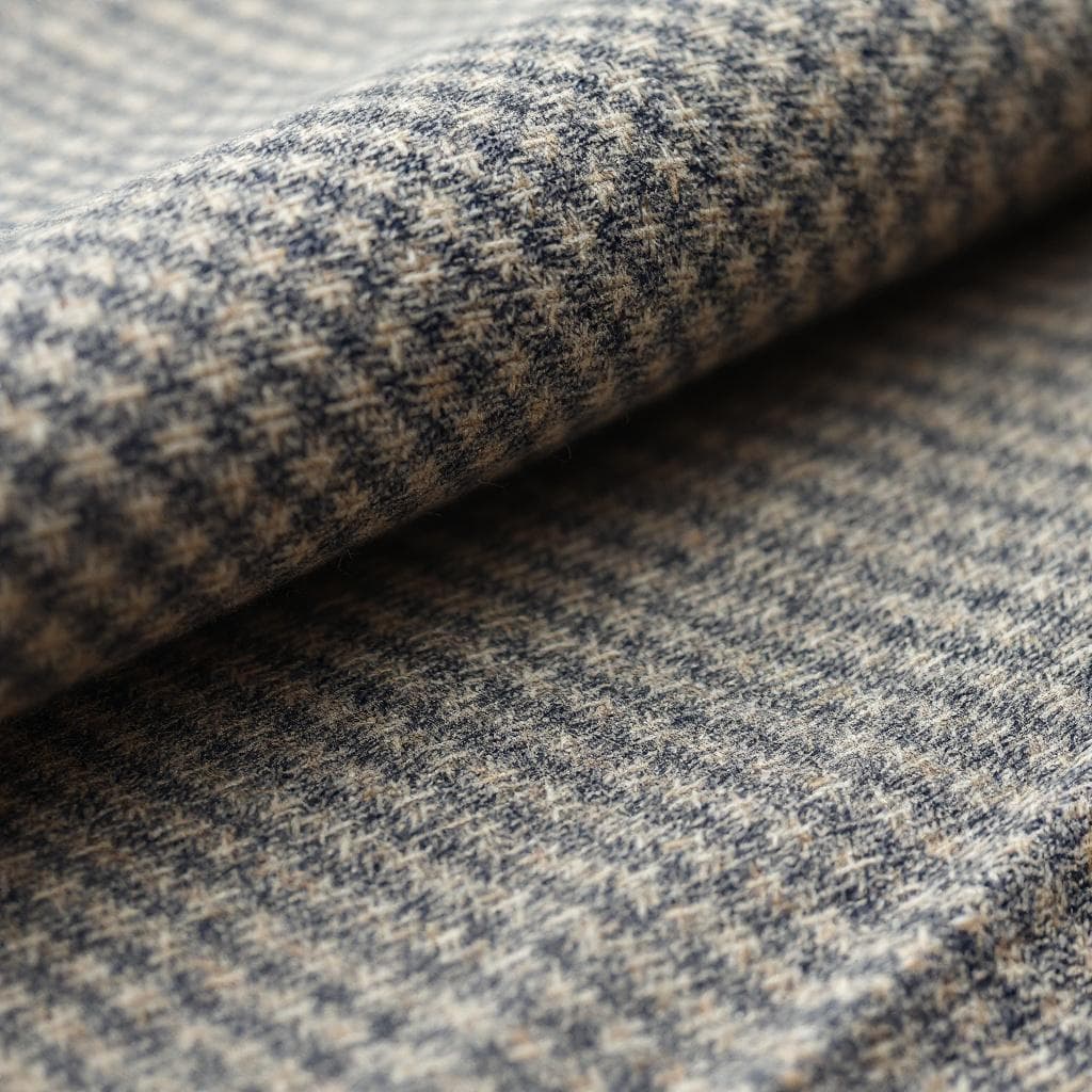 AI generated: Close-up of Canterbury cloth texture. A richly woven wool fabric with a subtle check or tweed patter...