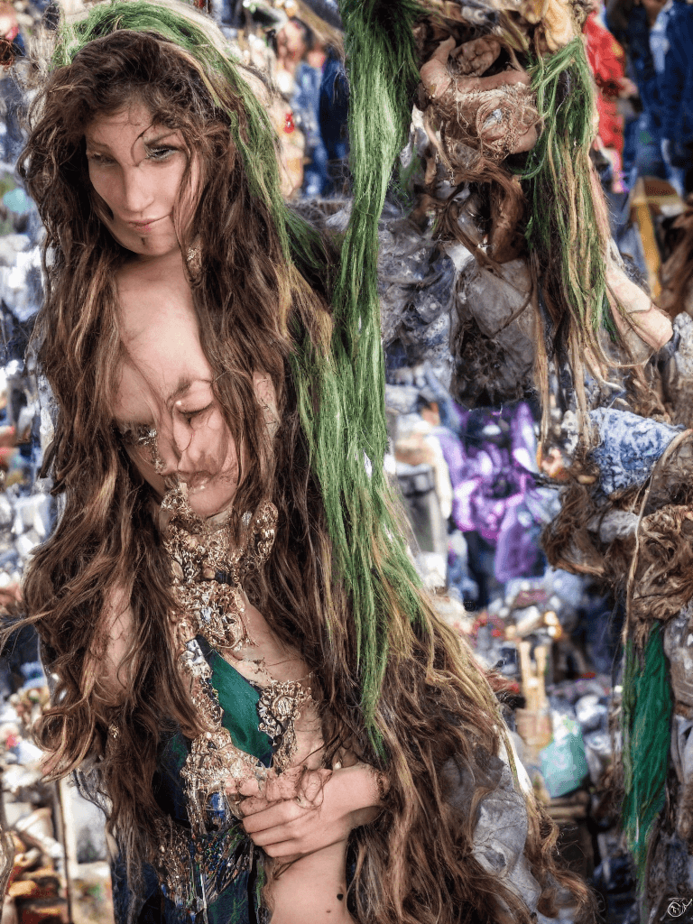 AI generated: A pretty girl in a crowded medieval market, market vendors, upper body, detailed clothes, green eyes...