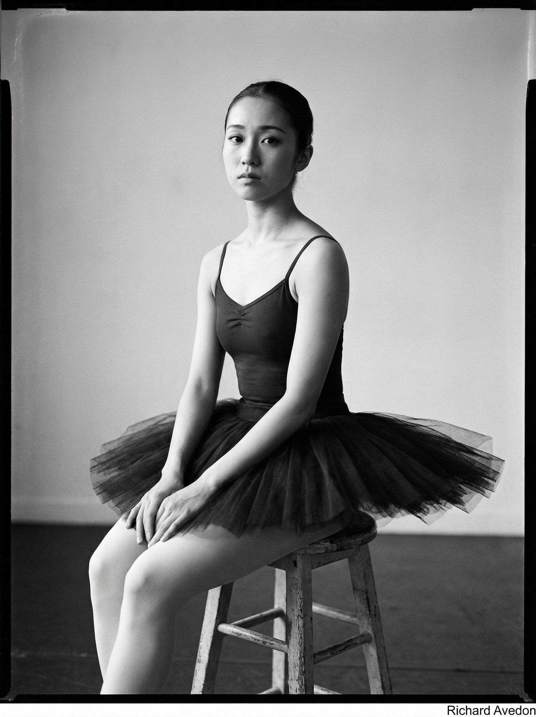 AI generated: a black-and-white studio portrait of a Japanese ballerina, with 35mm film grain, in the style of Ric...