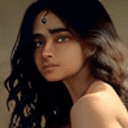 AI generated: An (18:1.3) year old  Bollywood heroine innocent looking (woman:1.1) with (dark:1.2) wavy hair is to...