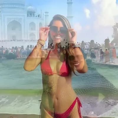 AI generated video: Wearing 2 pcs hot bikini at the beach her face to the camera