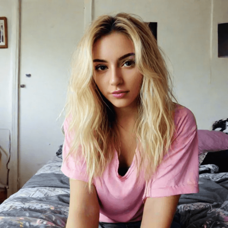 AI generated: In this webcam photo taken with a damaged 80s webcam, a woman with blonde hair is wearing casual out...