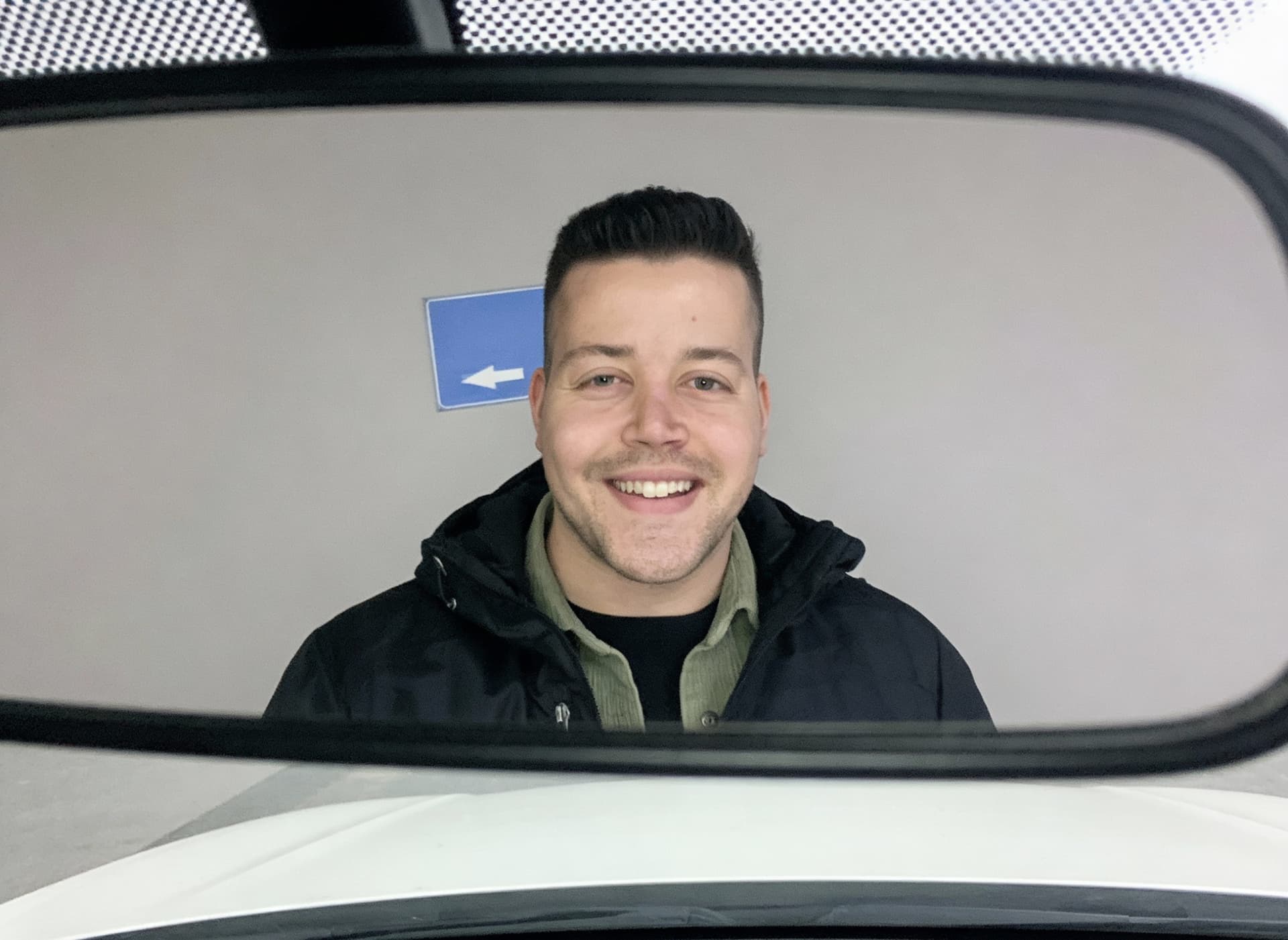 AI generated: Next to me. Remove the blue text. Put me in the middle. Pretend it's like using the rearview mirror ...