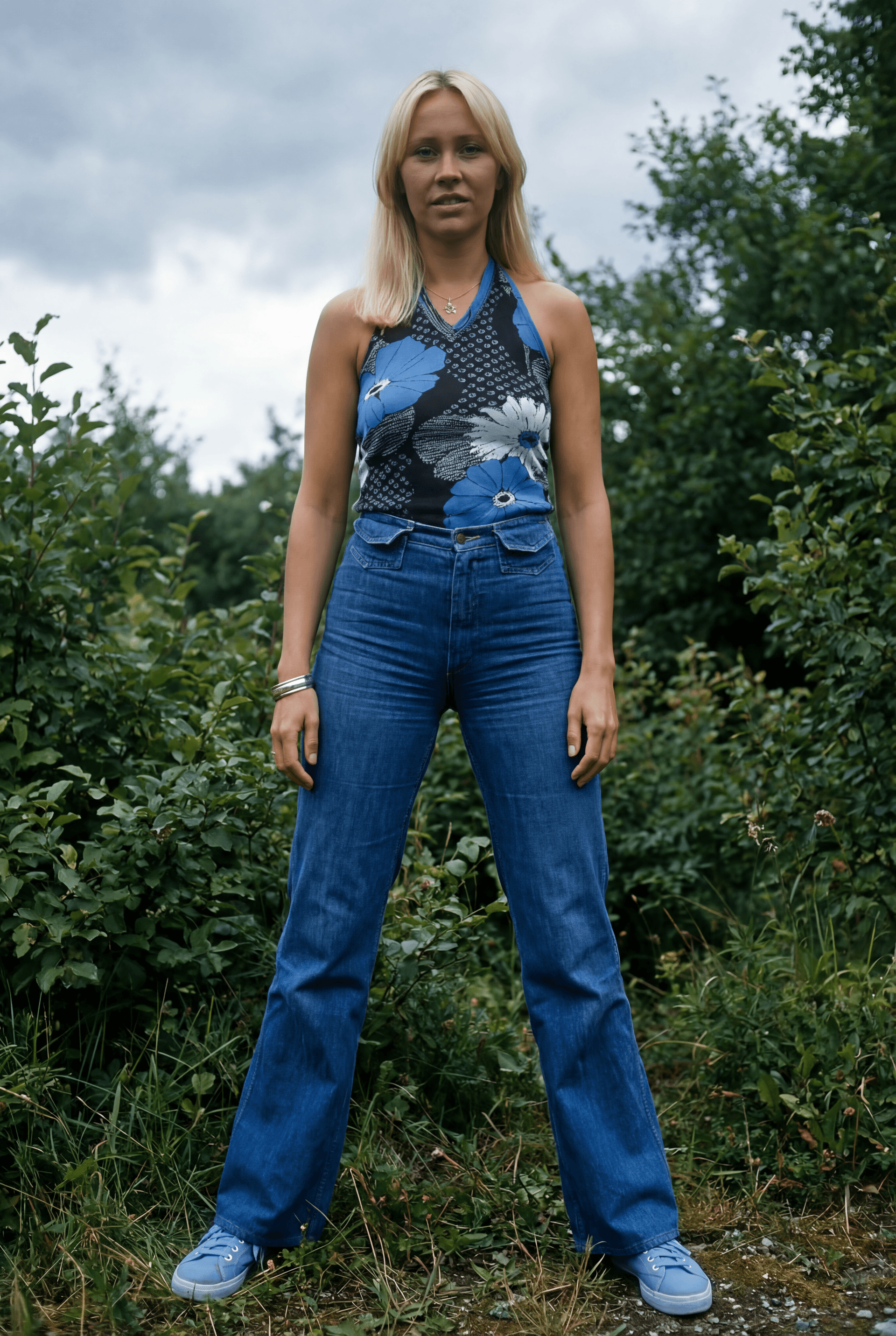 AI generated: Please have Agnetha Faltskog face towards the camera, have her legs are apart and wearing matching s...