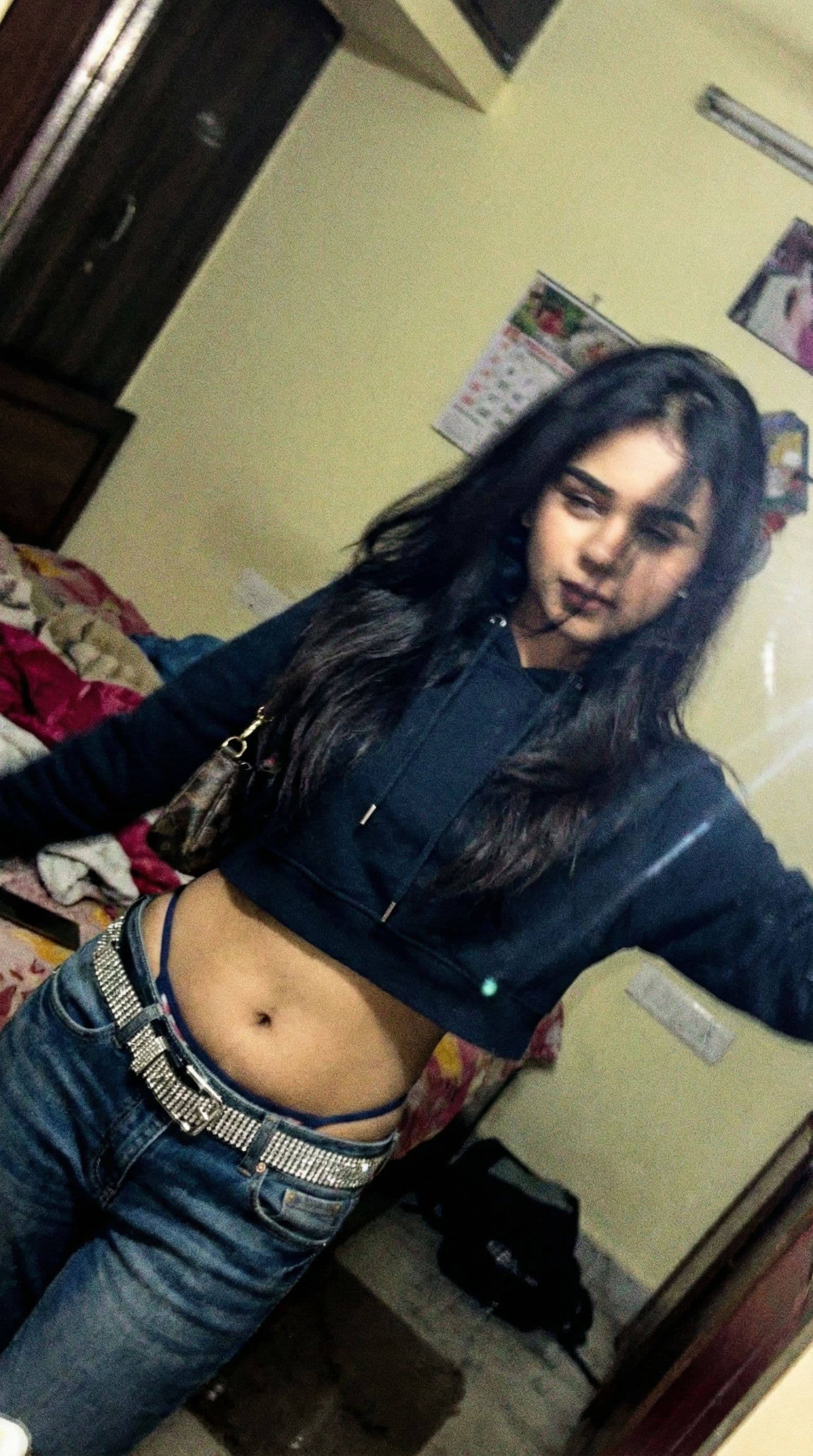 AI generated: a lo-fi 2015s-era, diagonally taken, low-quality iPhone photo of a 20-year-old baddie. The shot is i...