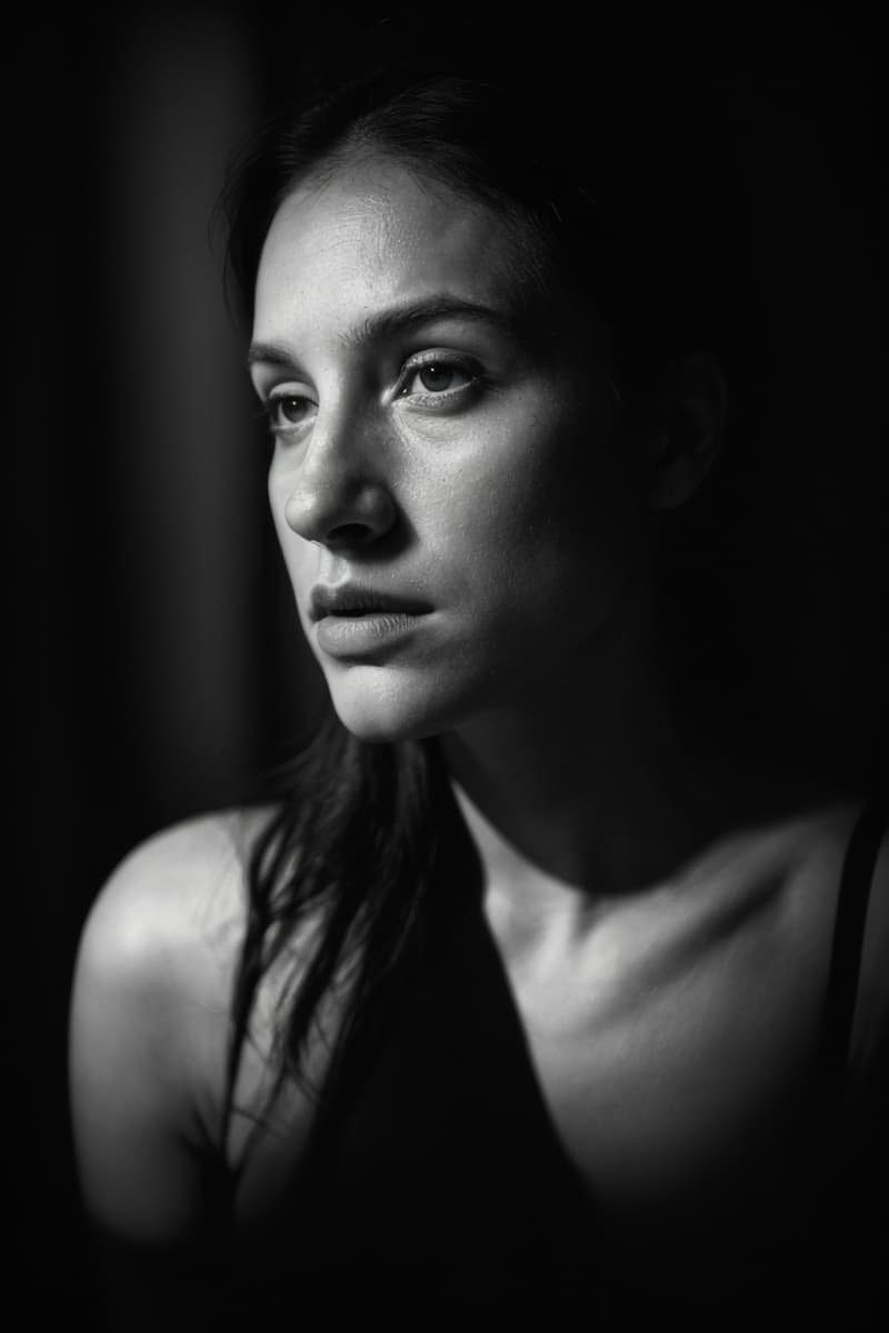 AI generated: Set on a tripod for stability, the camera captures the intimate, psychological edge of the scene. Th...