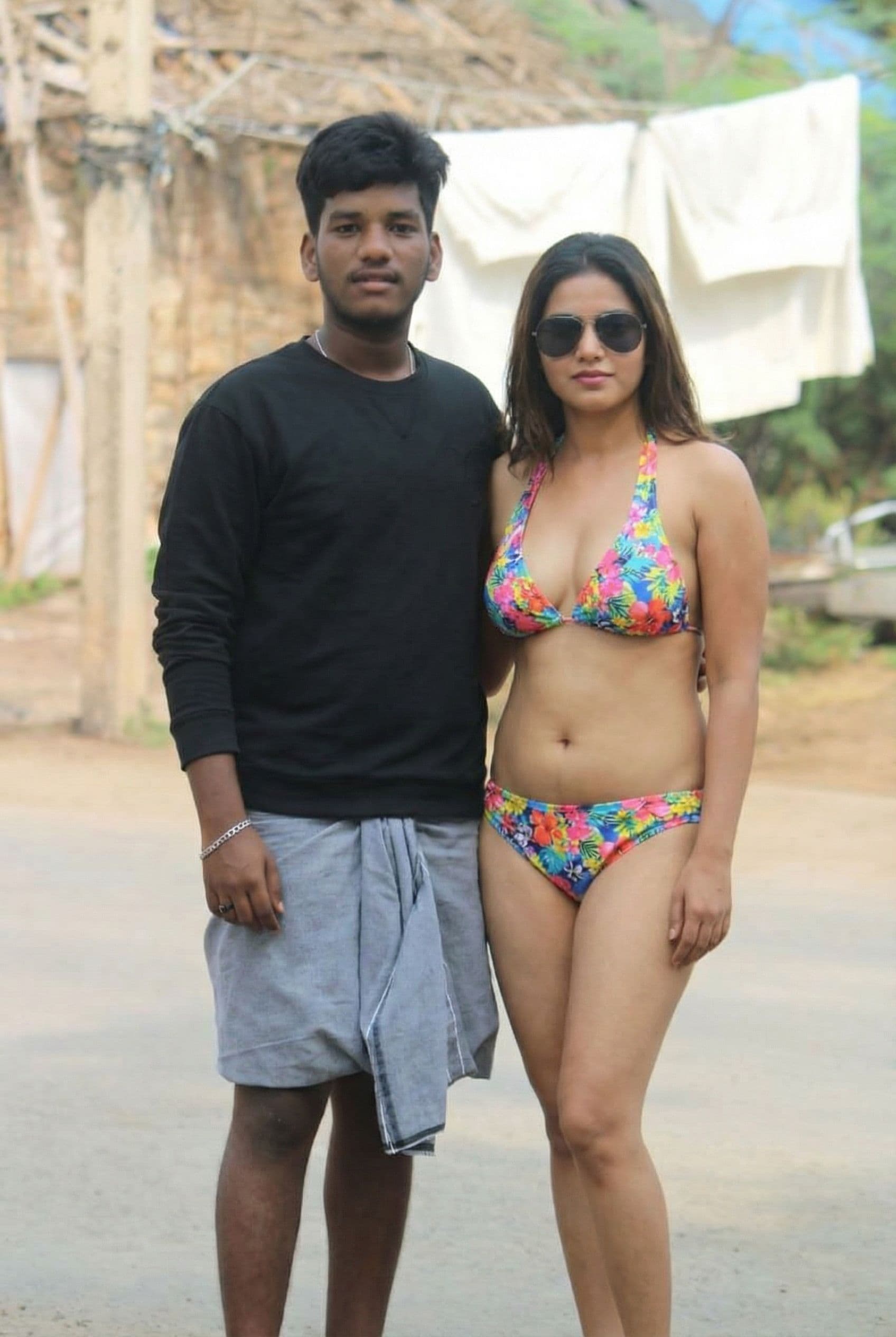 AI generated: Make him with bikini lady